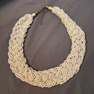 Braided, beaded, white necklace.
